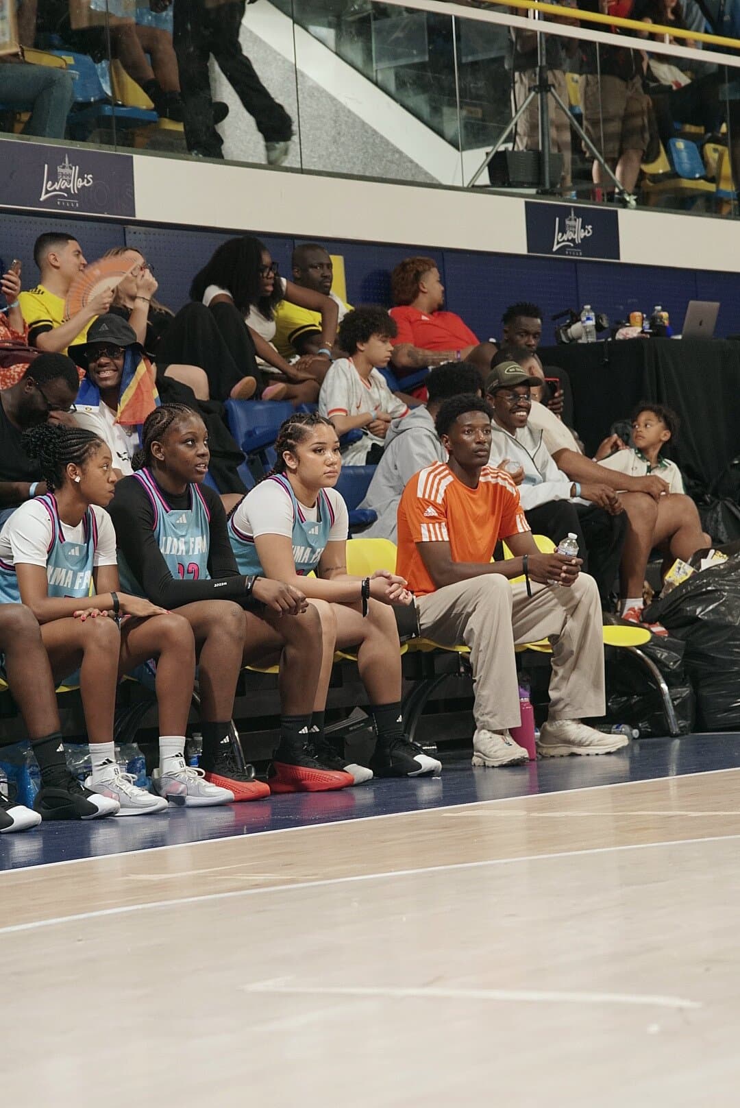 Xima Athletics talent courtside